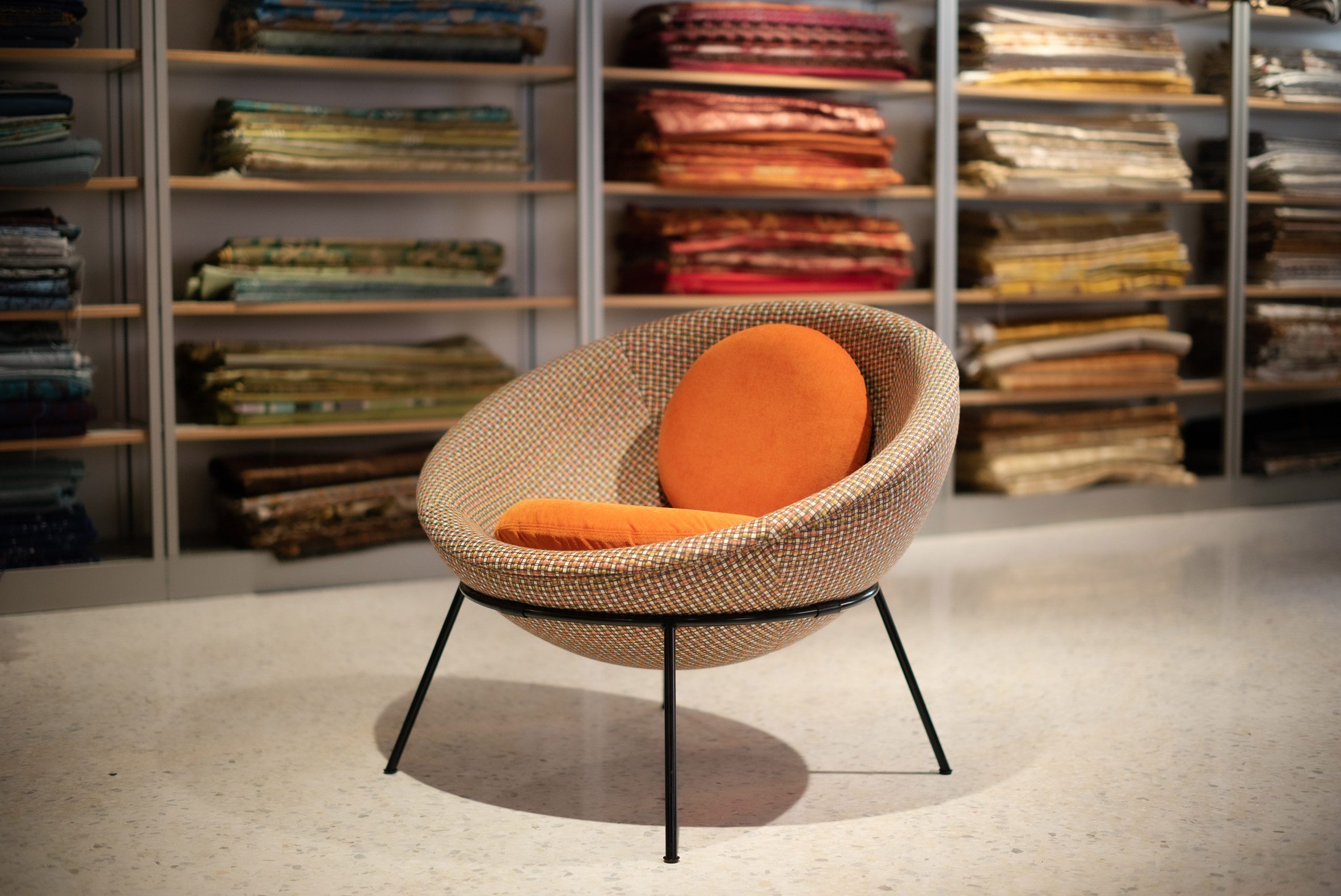 A photograph of Bardi's Bowl Chair by Lina Bo Bardi for Arper in Eureka