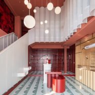 Bund Post Office designed by Yatofu features red, white and green interiors
