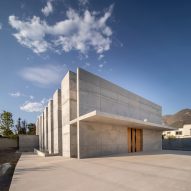 Concrete and travertine form minimalist chapel in northern Mexico by WRKSHP