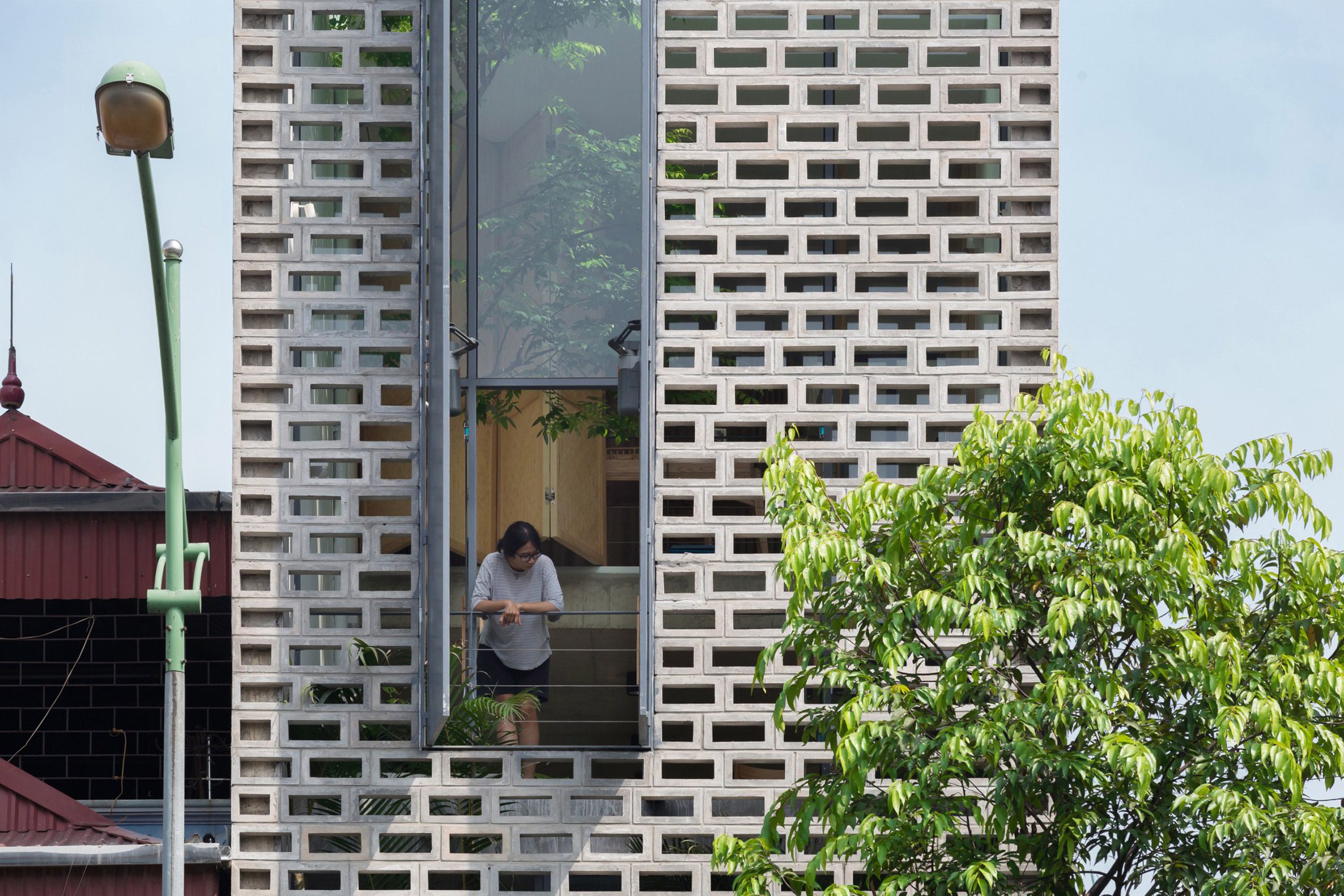 Concrete screen facade of CH House by ODDO Architects