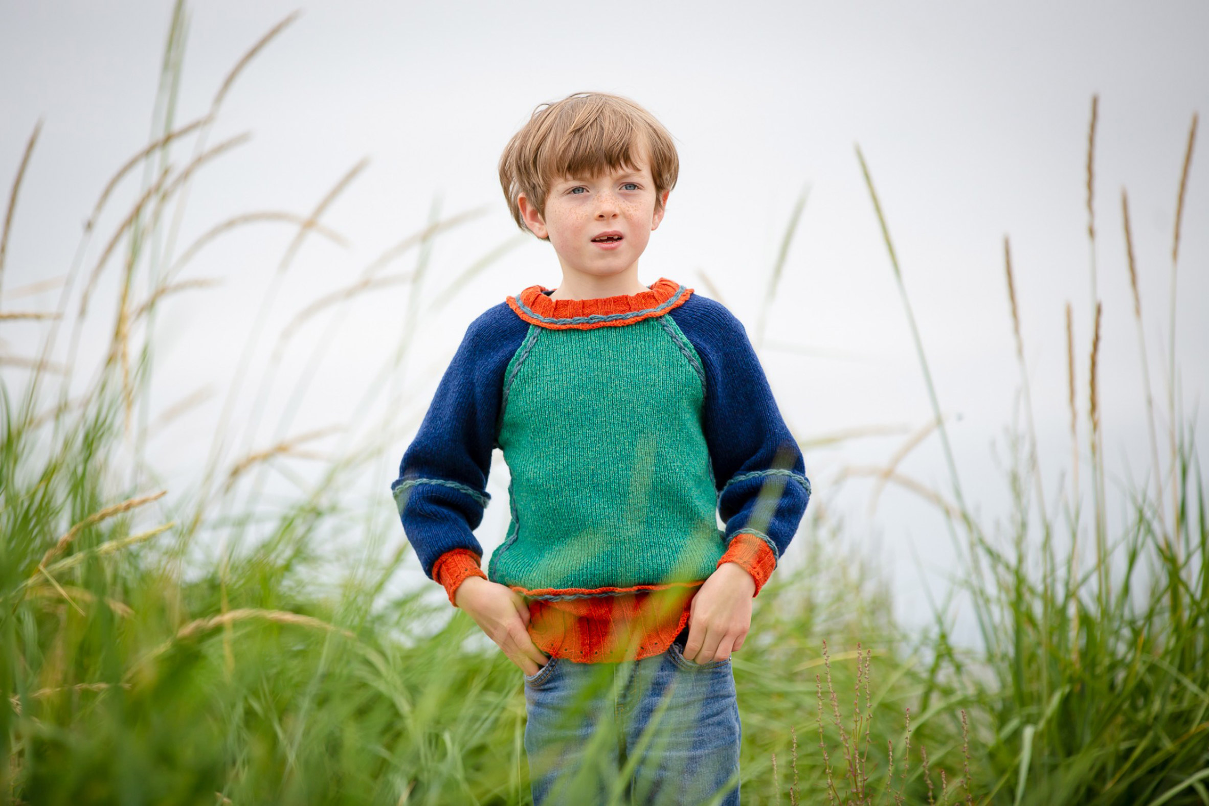 Young boy in knitted jumper