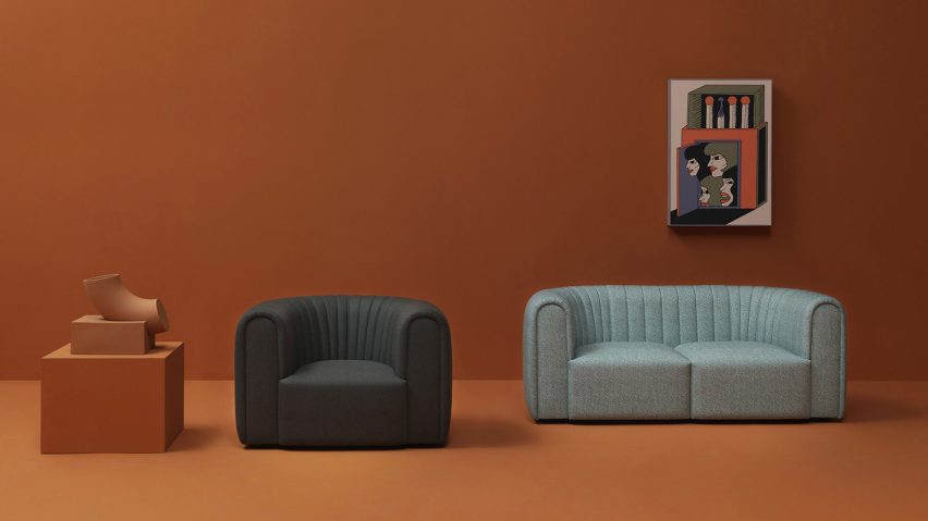 Core armchair by Sancal in blight blue and sofa in black