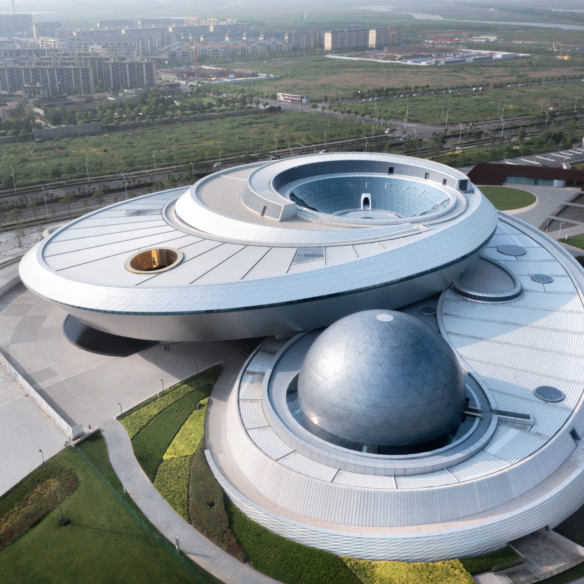 Aerial view of a large circular astronomy museum