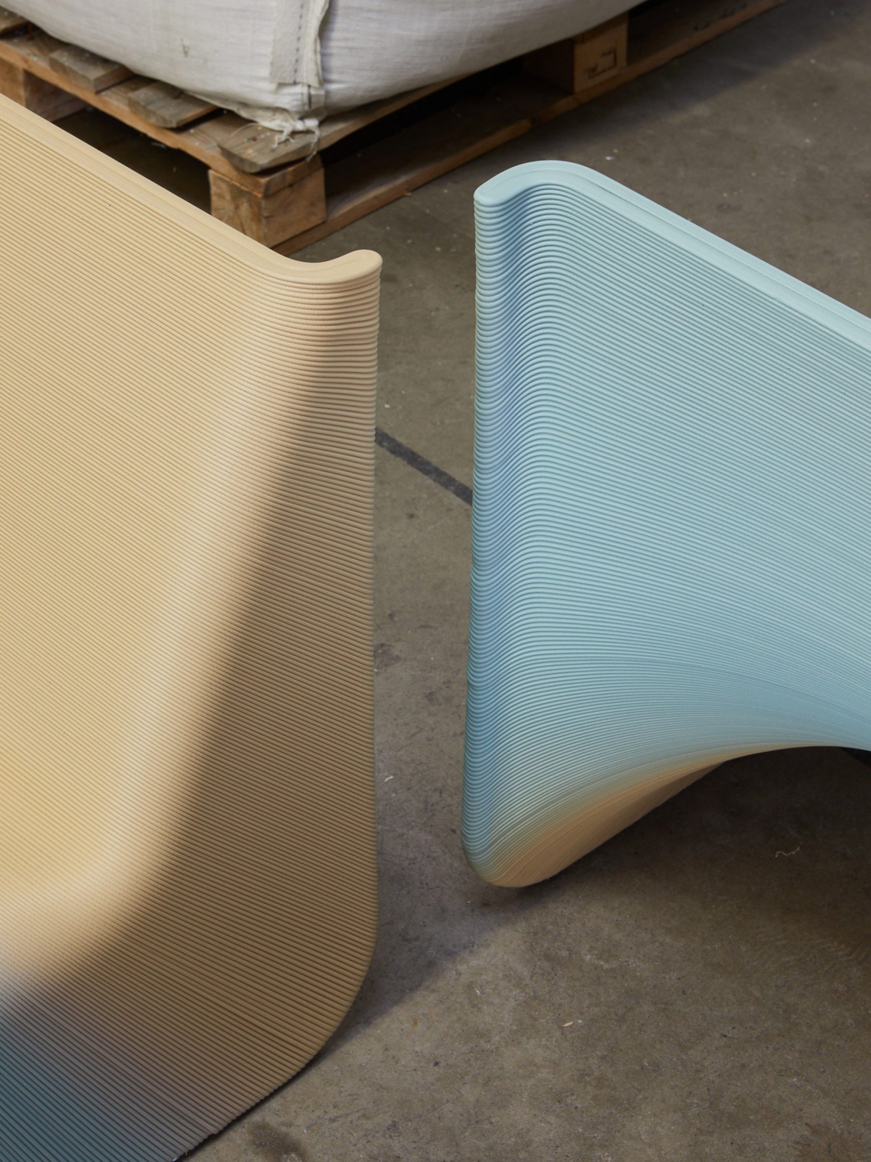 Close-up of curved backrest of 3D-printed plastic chat by The New Raw