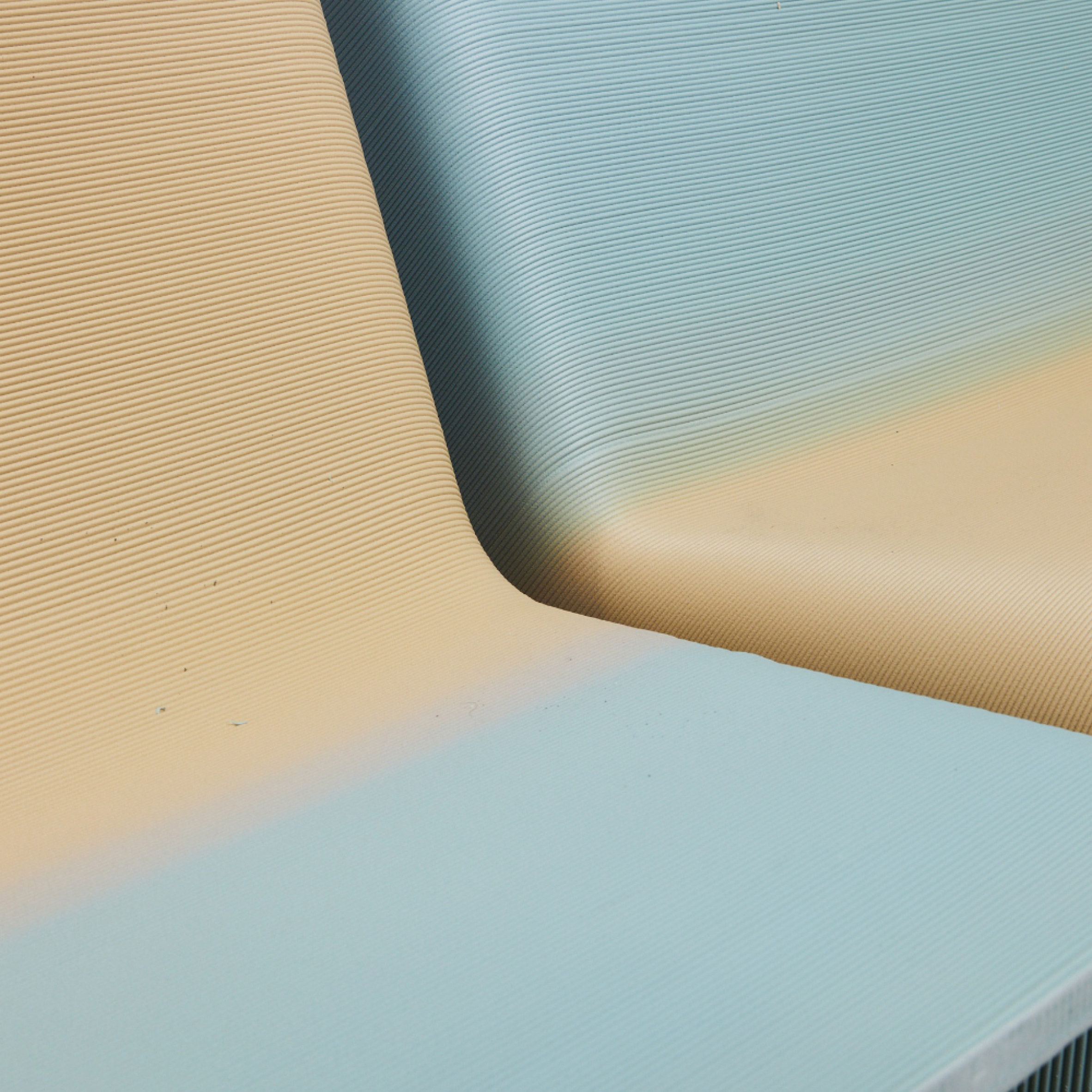 Close-up of blue and yellow gradient on 3D-printed chair by The New Raw