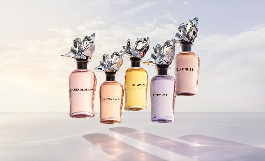 Five floating perfume bottles from the Les Extraits collection