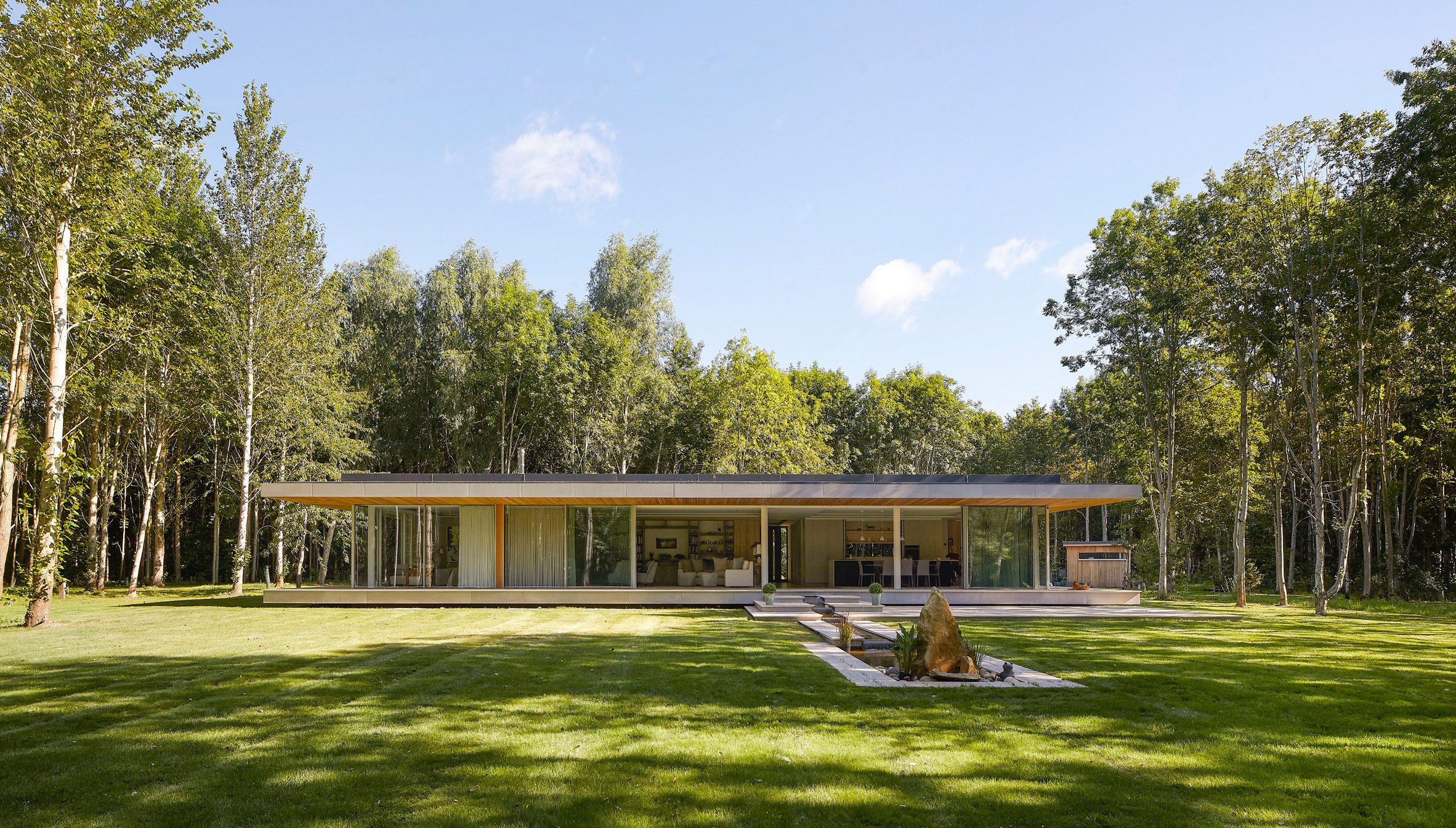 Glass facade of House in The Lakes by Yoo, by Broadway Malyan