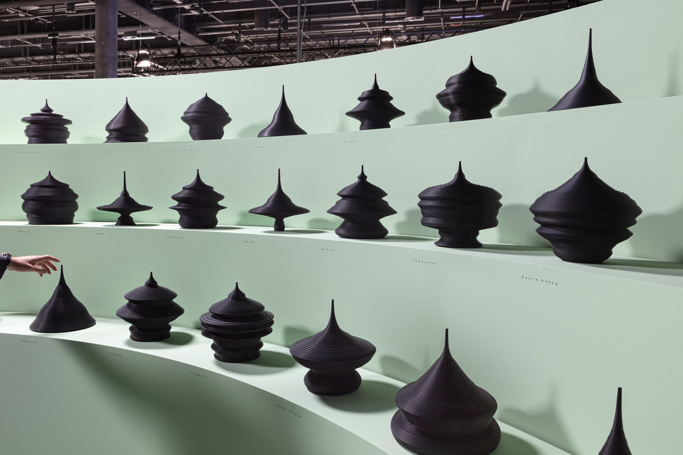 Rows of black sculptures by Mathieu Lehanneur