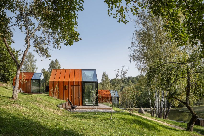 The cabins at Ziedlejas Spa and Wellness Resort have a corten steel and glass exterior
