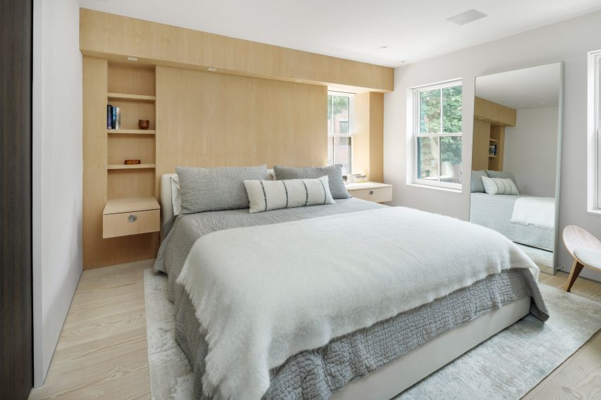 A bedroom has built in cabinetry at boston house