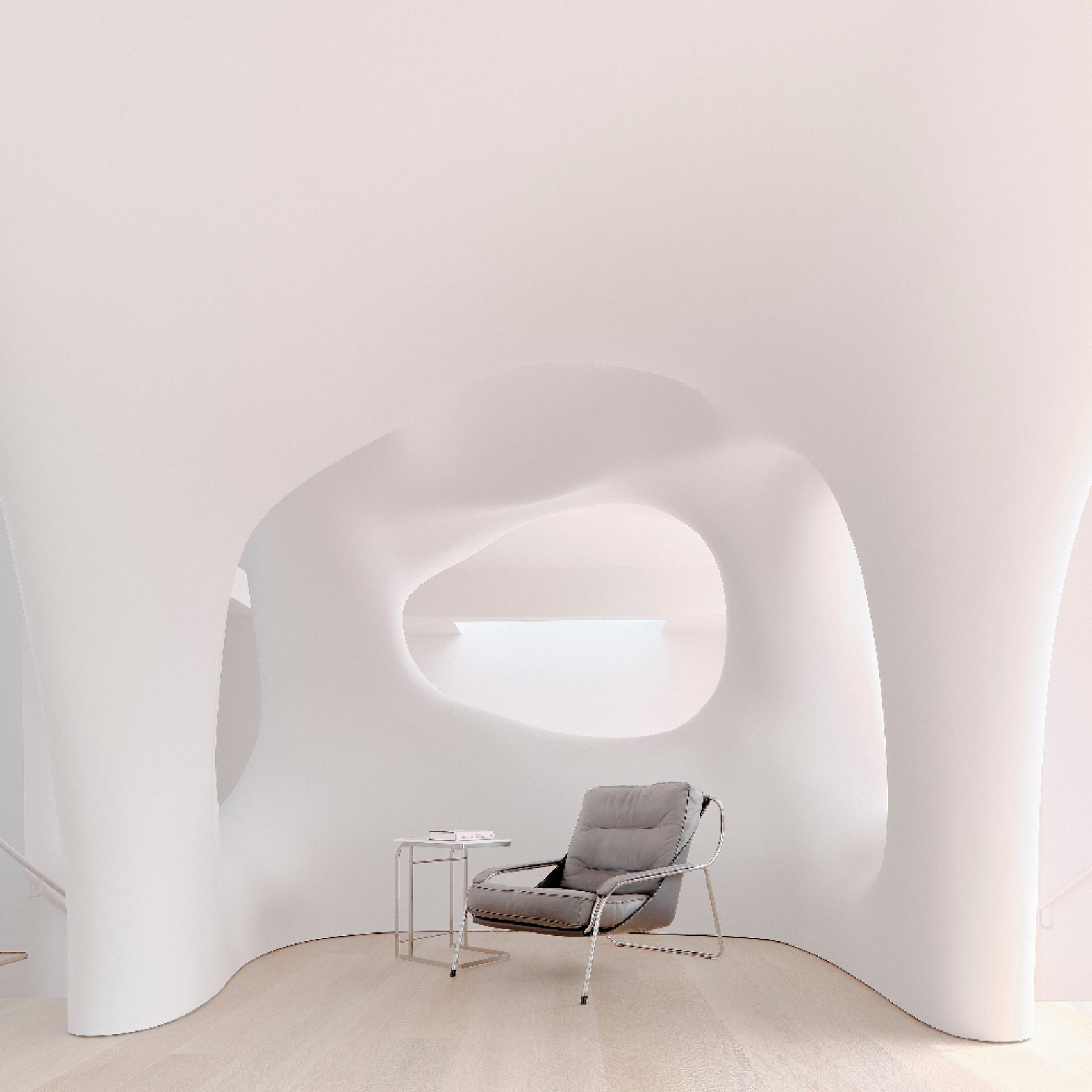 Seating nook of Softie house enclosed by undulating white walls