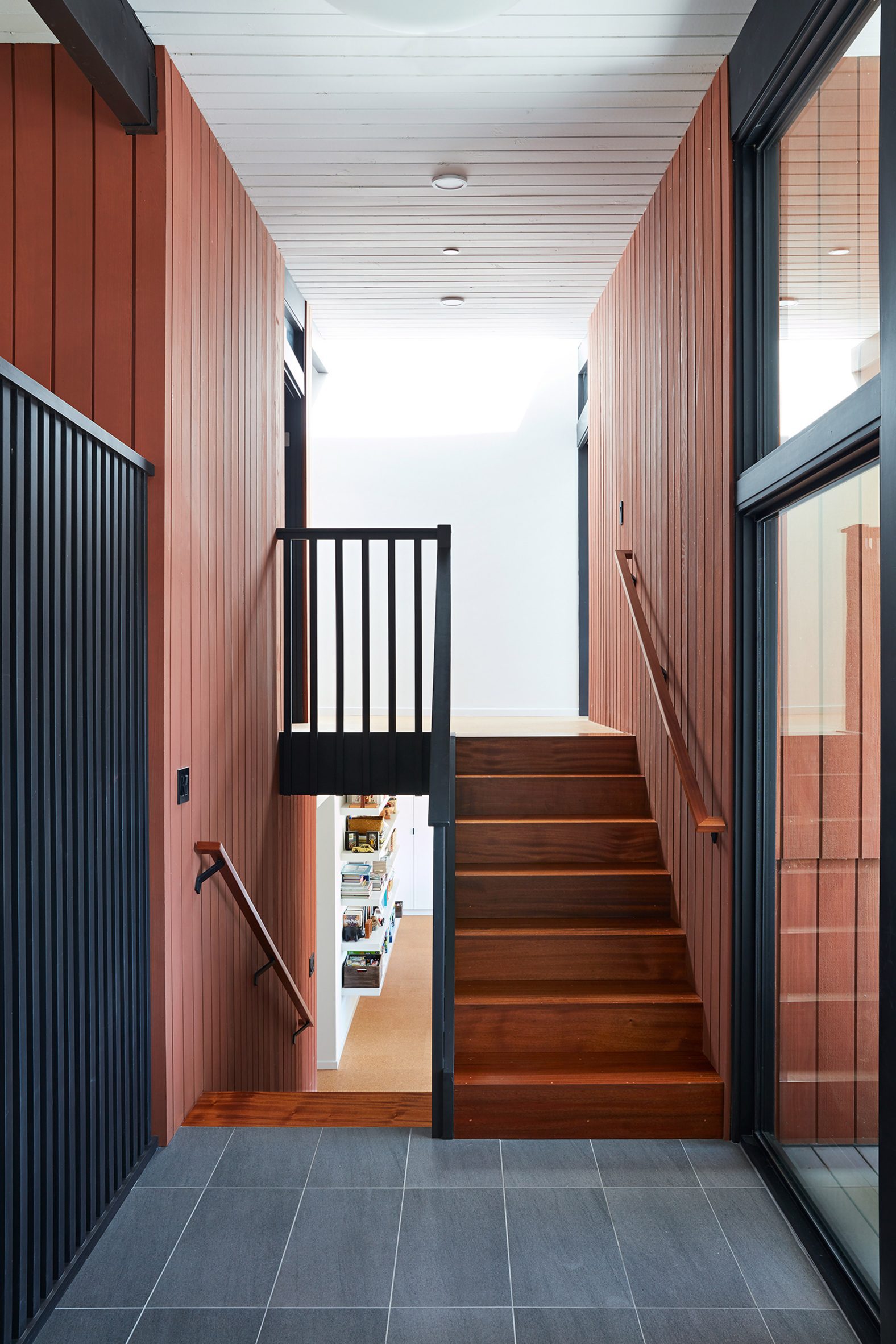 Klopf Architecture added a second staircase to the mid-century renovation