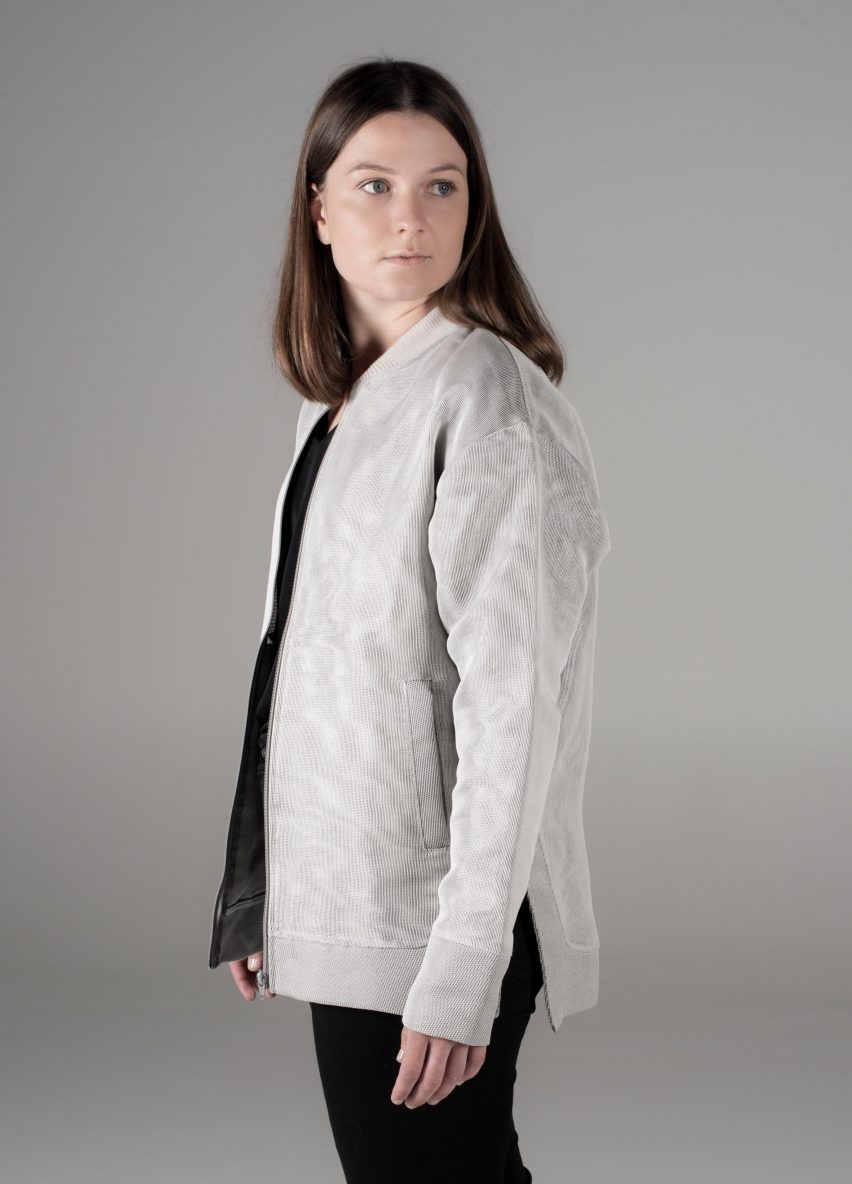 Light grey prototype jacket with integrated solar panels by Aalto University students