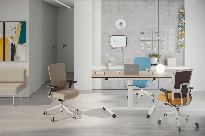 Desk by Actiu in an office environment surrounded by chairs