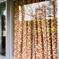 Dedar's Be Bop A Lula fabric with rusty orange palm trees being used as curtains