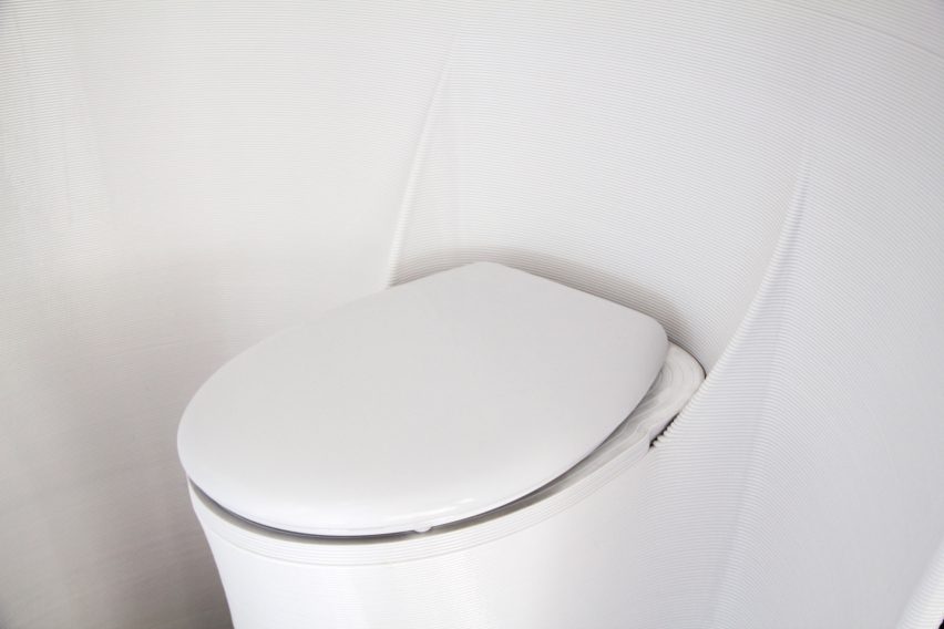 Separation toilet seat in The Throne portable toilet
