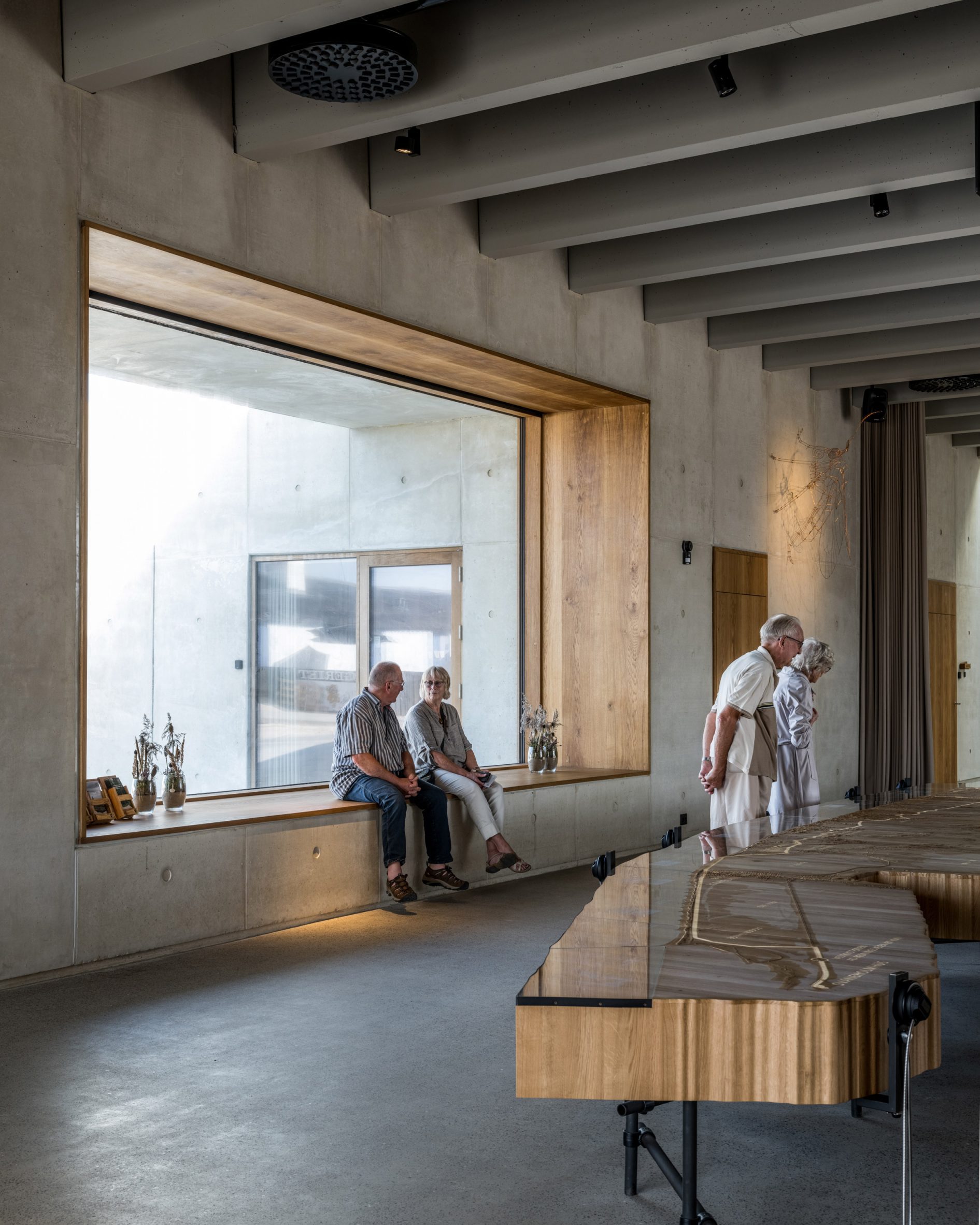 Danish visitor centre with wood and concrete interiors