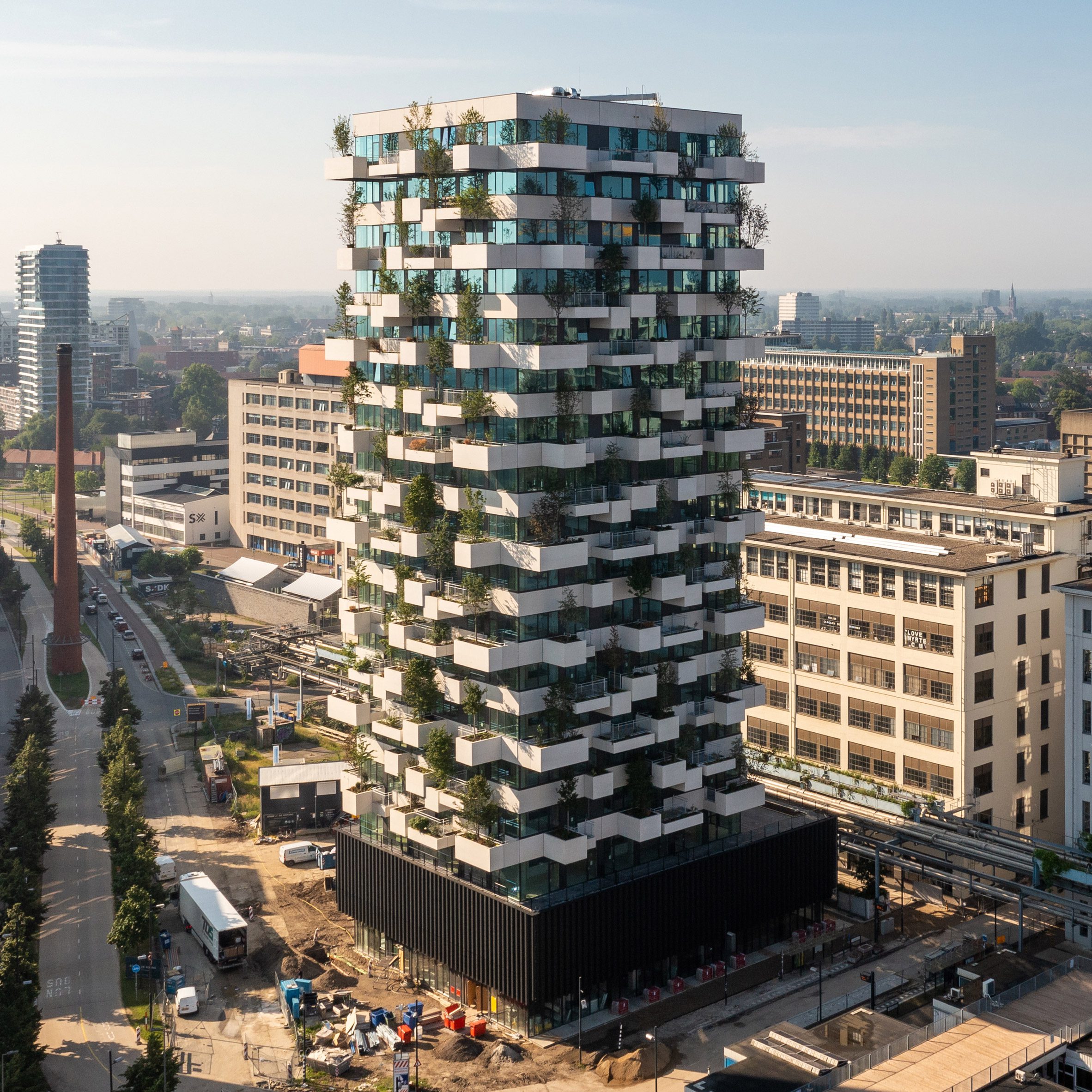Trudo vertical forest is wrapped in plants and trees