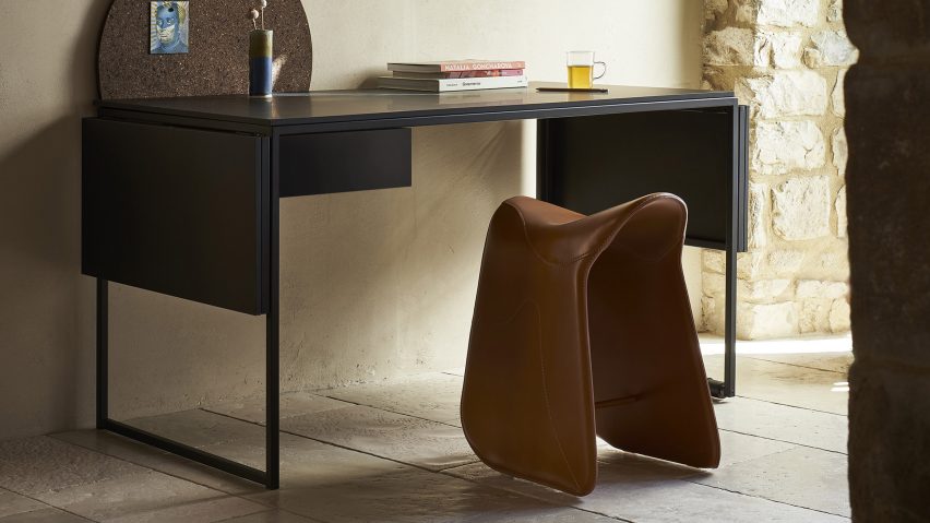 Opinion Ciatti's Macis desk in black leaned against a wall