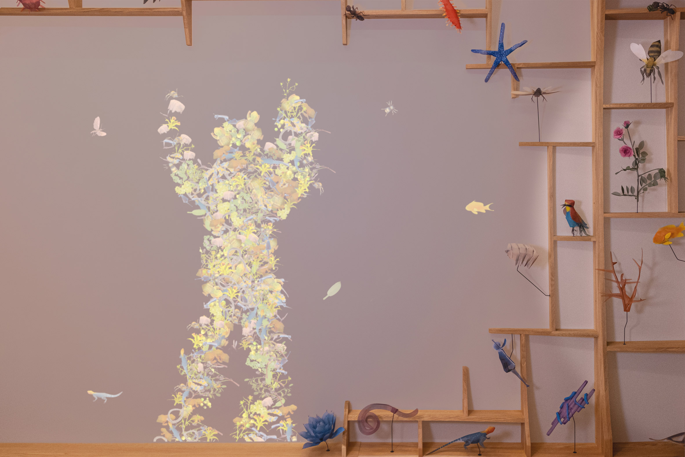 A photograph of the installation: an floral outline of a person dancing