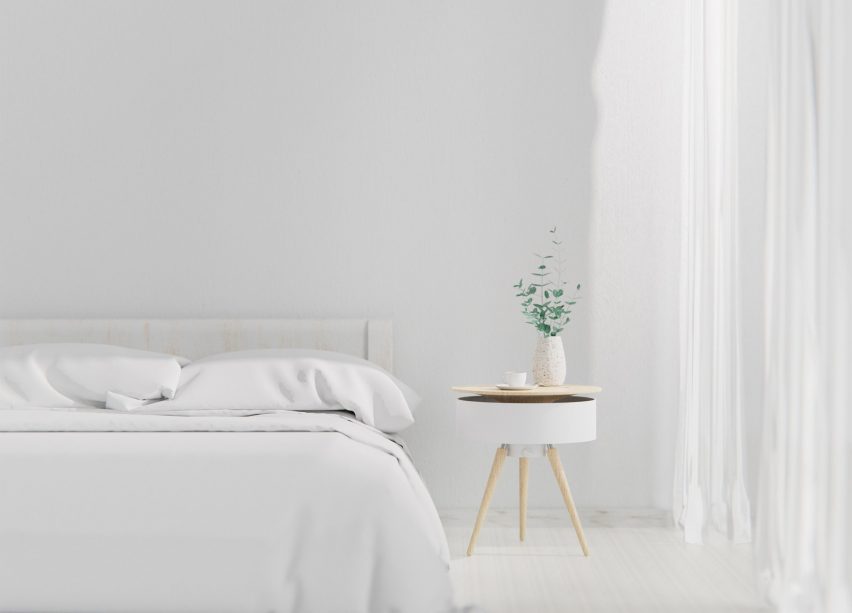 Rendering of the Brise table beside a bedside in an all-white room