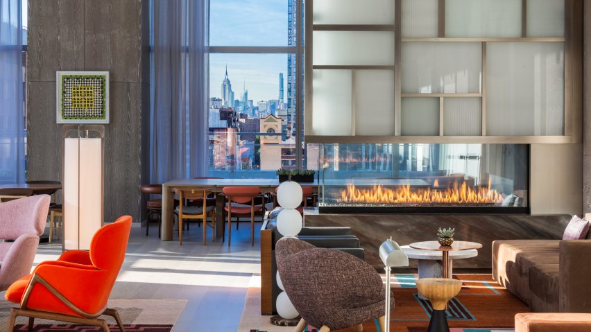The lounge has views out to the New York City skyline