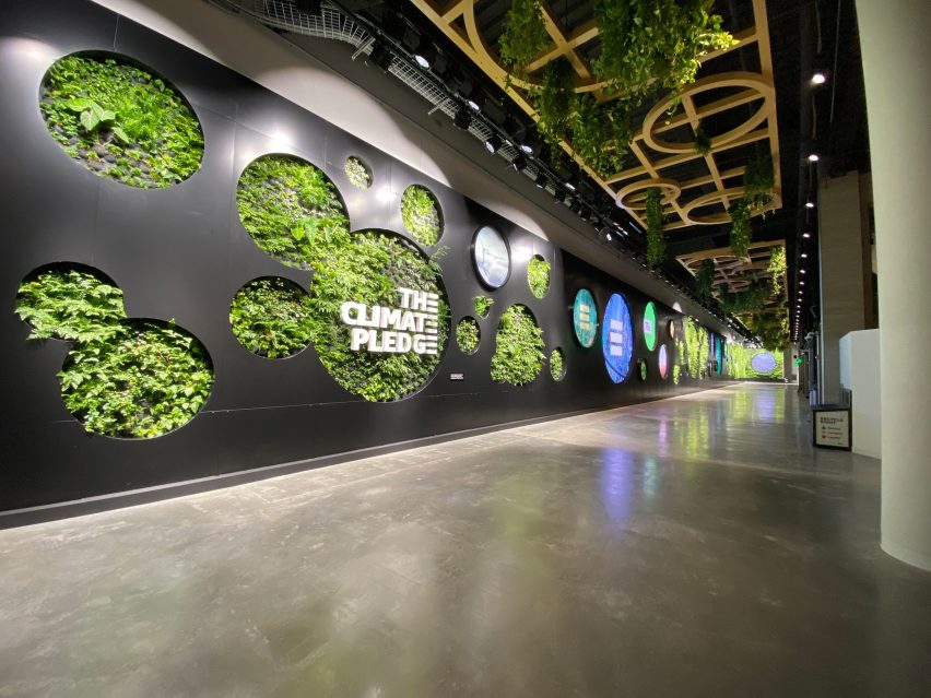 Corridors at the Climate Pledge Arena have green walls 