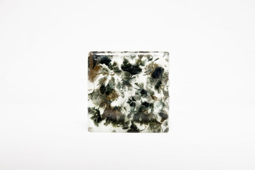 Black speckled translucent glass tile