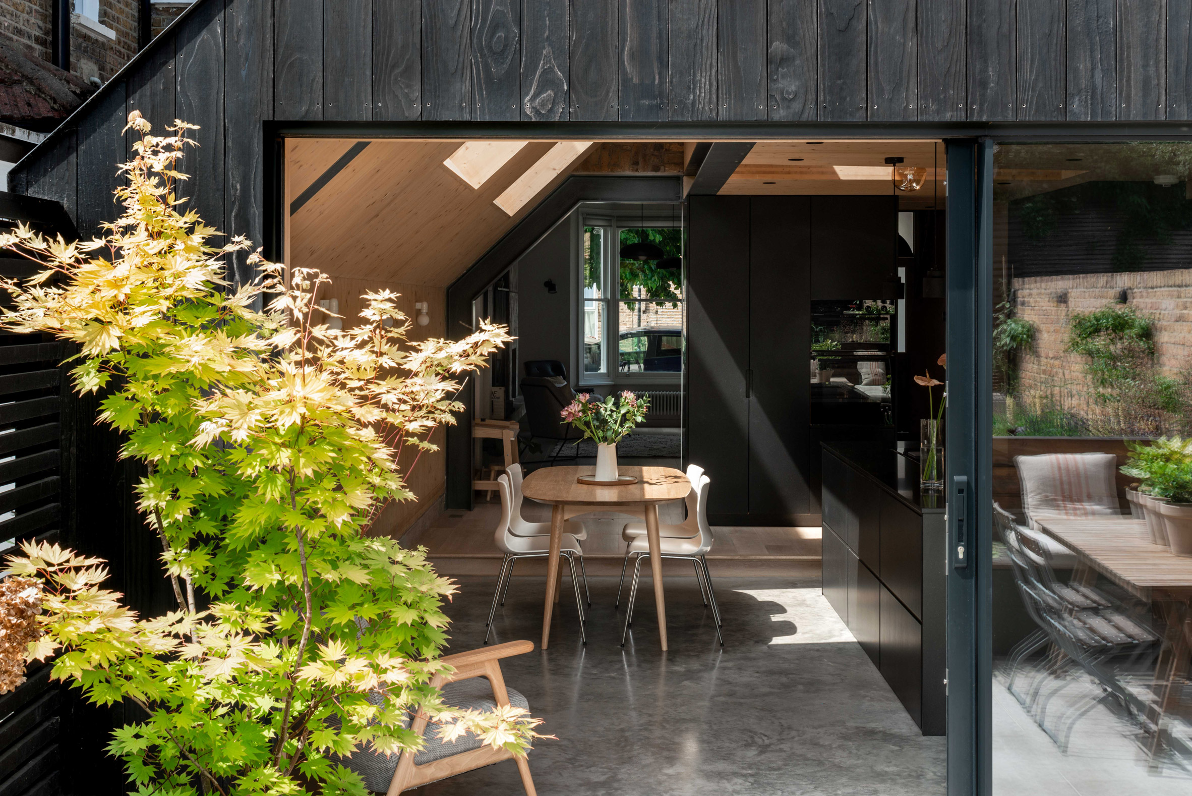 charred timber extension by Gresford Architects