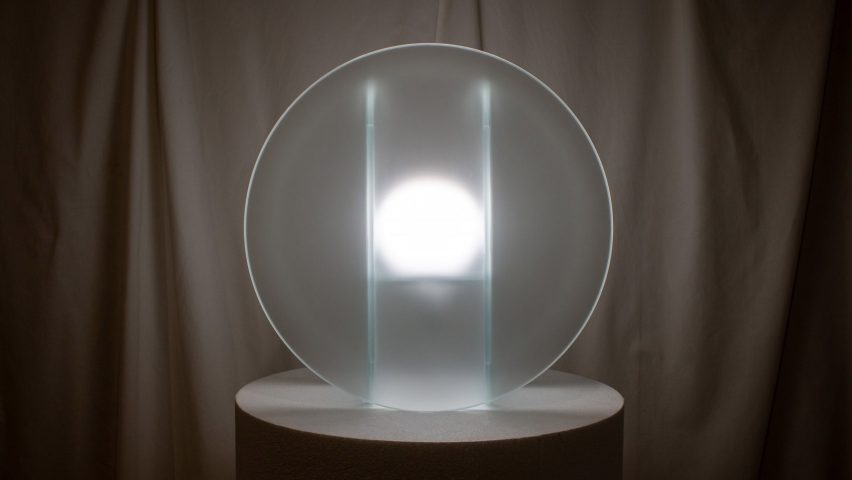A round, glass Daylight lamp by Dean Norton