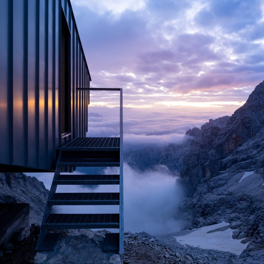 View of the side of the cabin with views across the Dolomites
