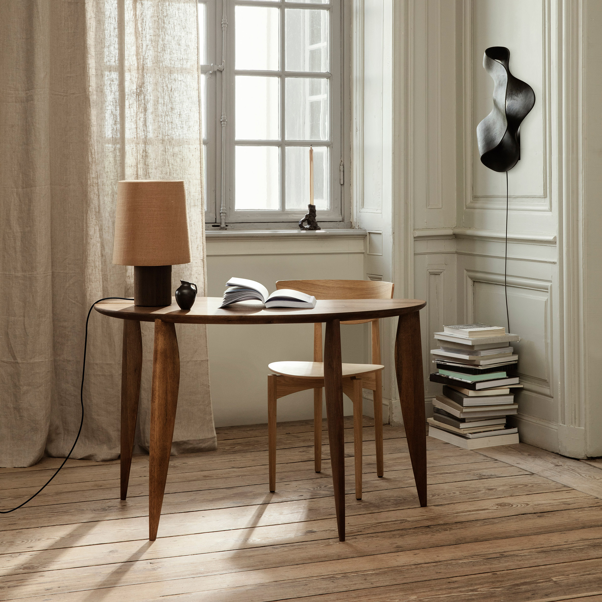 A photograph of the brown Feve desk made in walnut