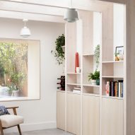 Sitting room with wooden shelving