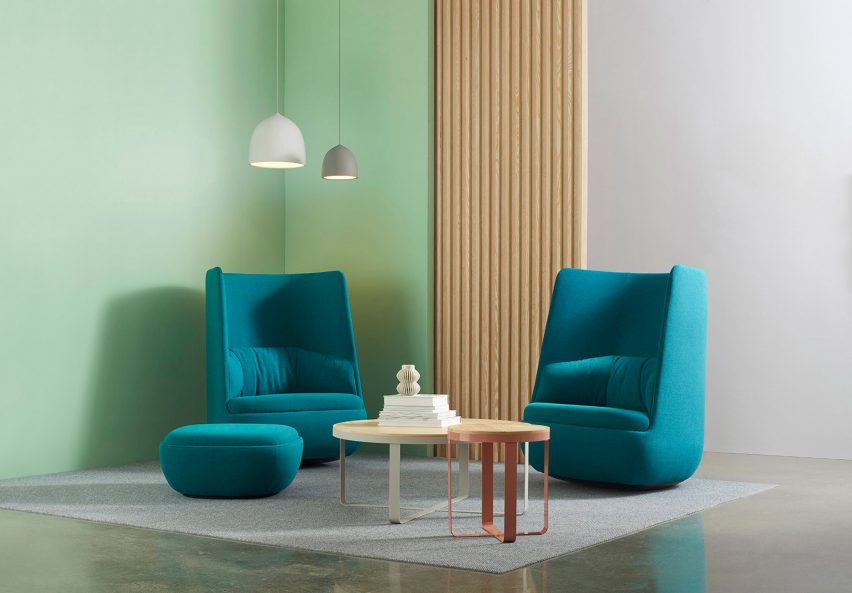 Two blue Gimbal Rocker lounge chairs by Justin Champaign for Hightower in an office