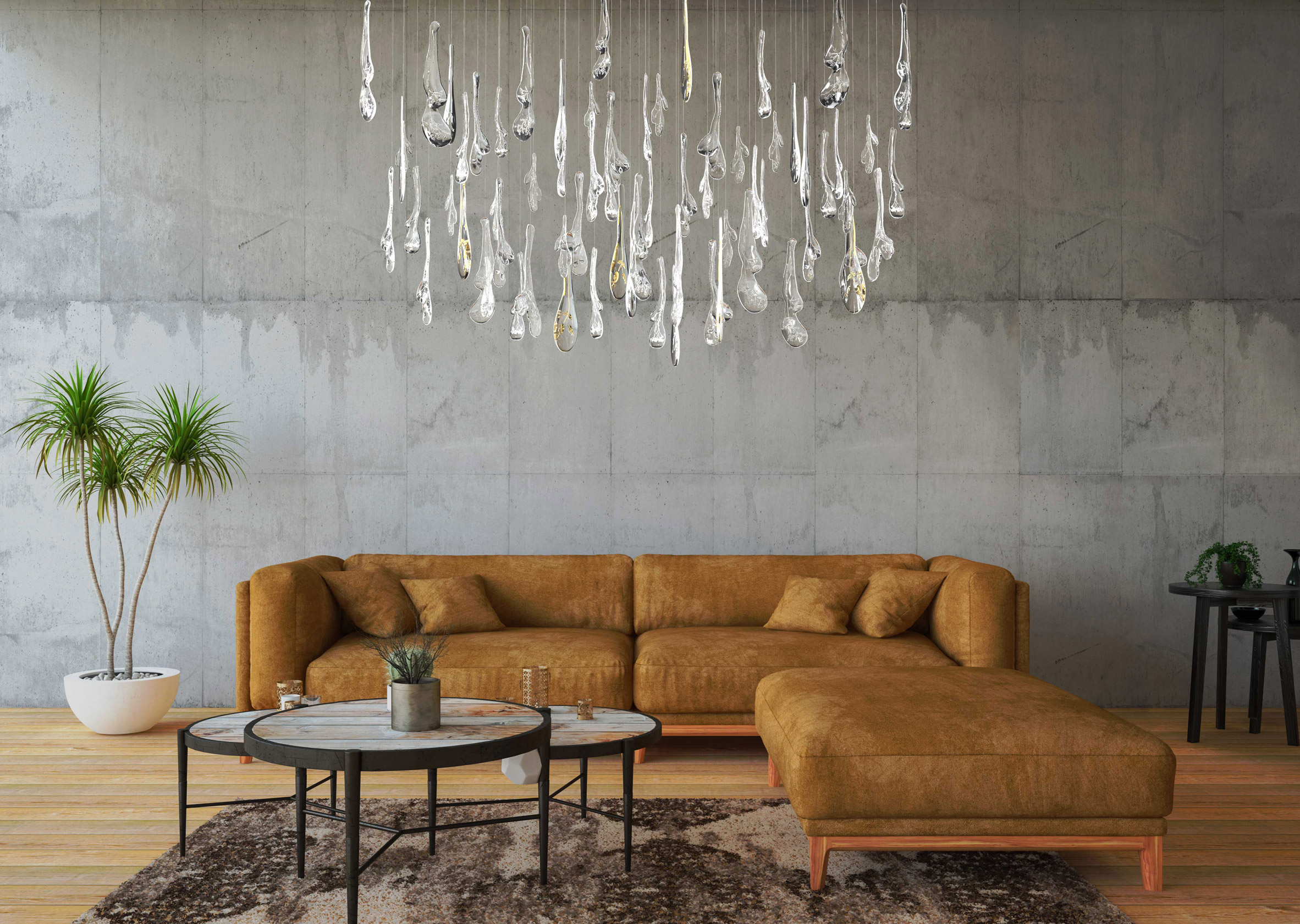 Glass lighting installation by Maria Culenova hanging over a brown sofa in a living room