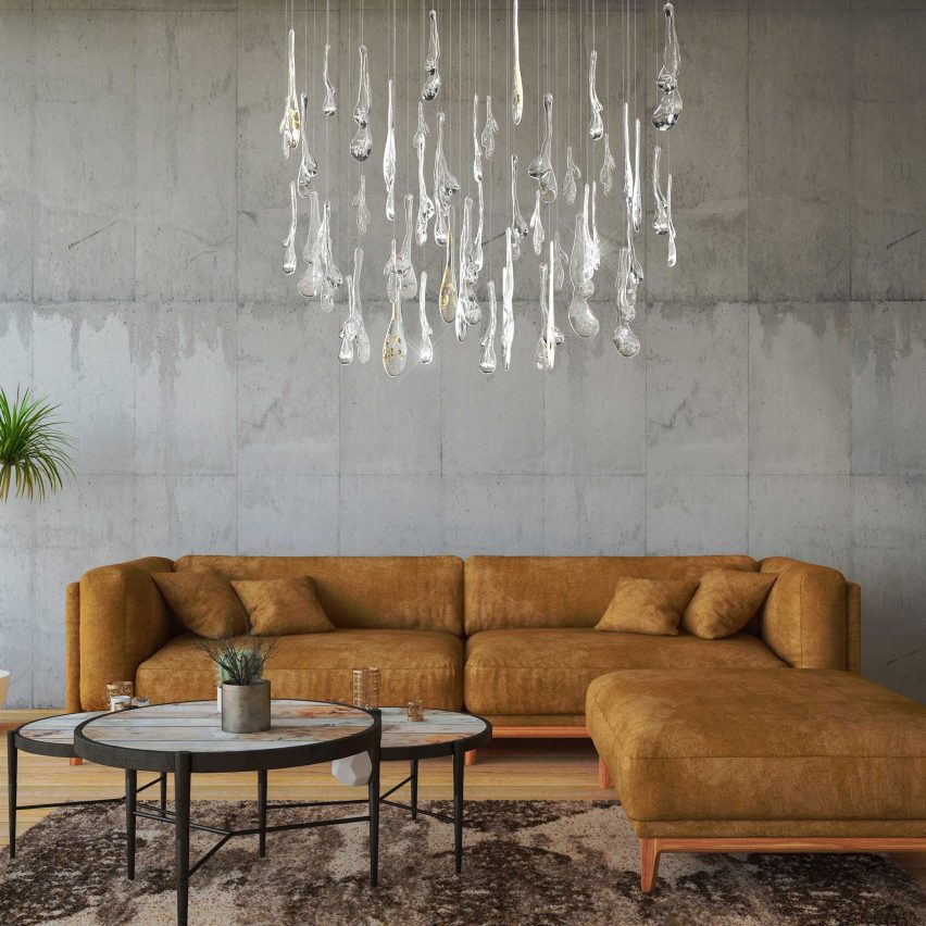Herbarium lighting installation by Maria Culenova for Lasvit hanging over a brown sofa