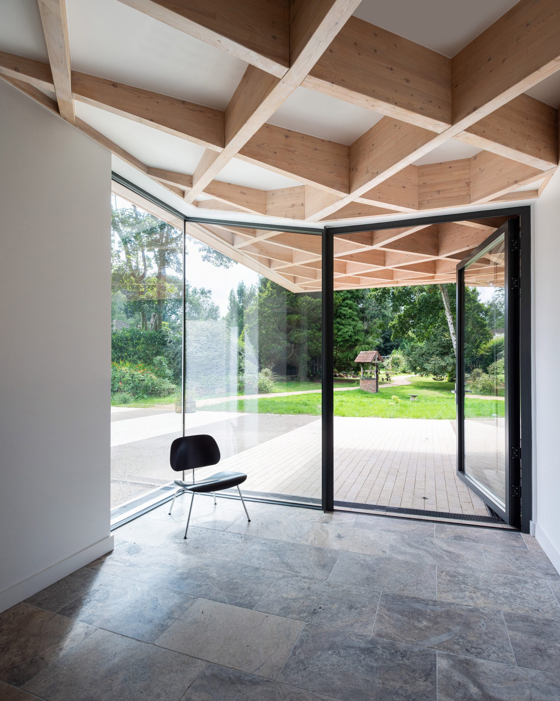 Timber diagrid roof in House for Theo and Oskar by Tigg + Coll