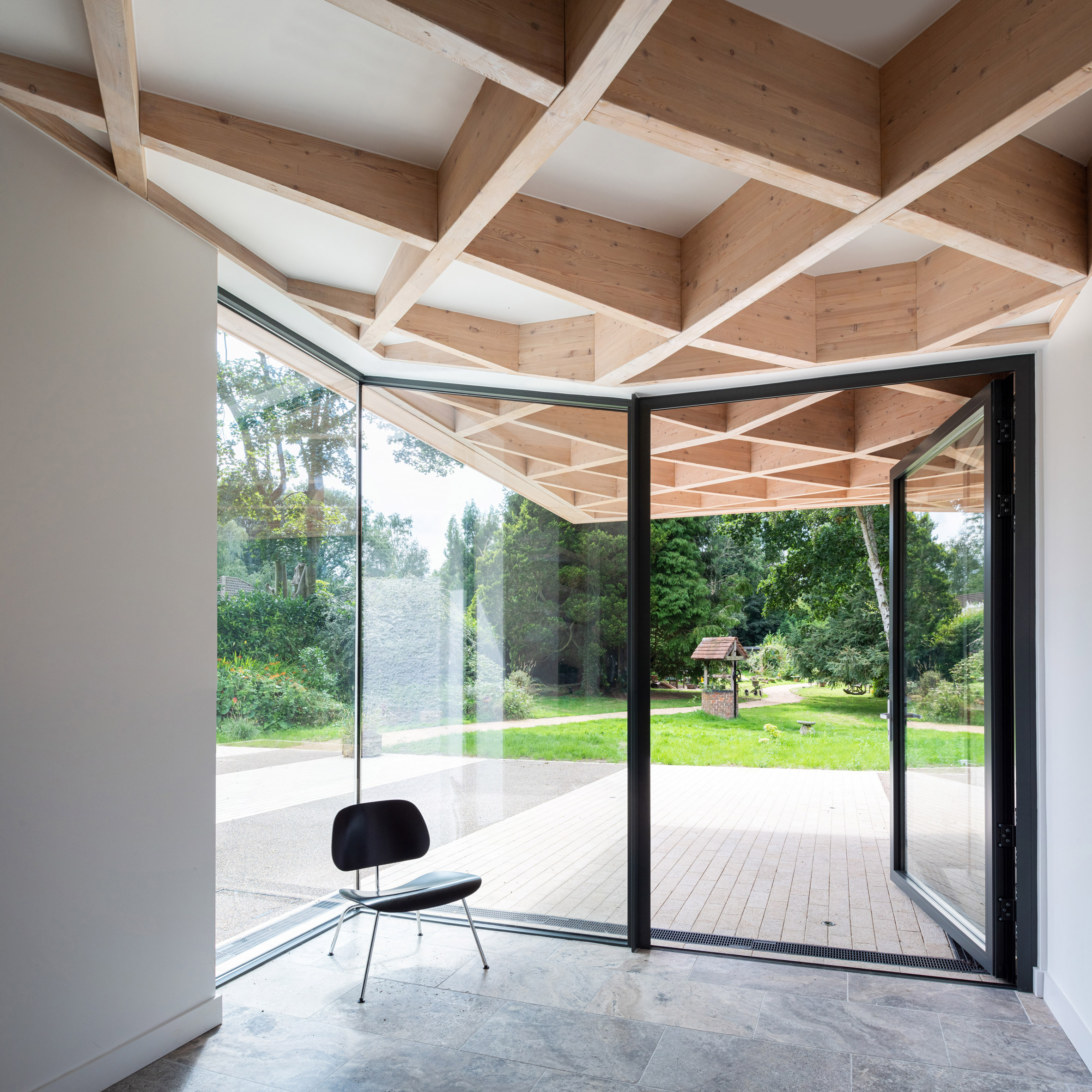 Timber diagrid roof in House for Theo and Oskar by Tigg + Coll