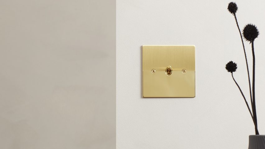 Matt and polished brass light switch faceplate by Kelly Hoppen for Focus SB