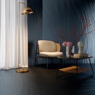 Luce tiles in navy blue used on the wall and in black on the floor of living room interior