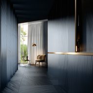 Luce tiles in navy blue used on the floor and walls of a residential corridor