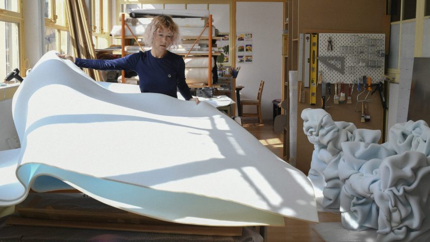 Geneva artist Flora Mottini examining foam upholstery for Massproductions' Face Lift project