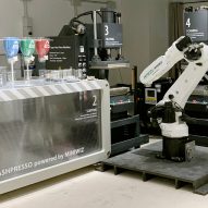 Mini Trashpresso recycling machine with robot arm and sorting bins