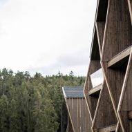 Aeon Hotel is a timber-clad hotel in Italy that was designed by NOA