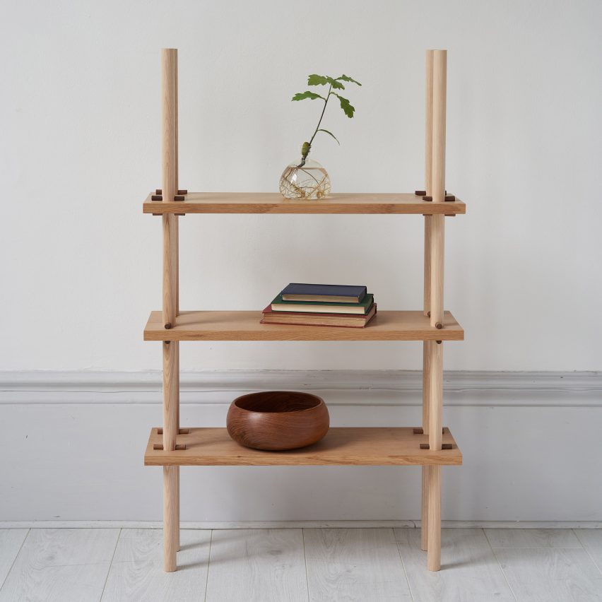 A woonden shelving unit with three shelves