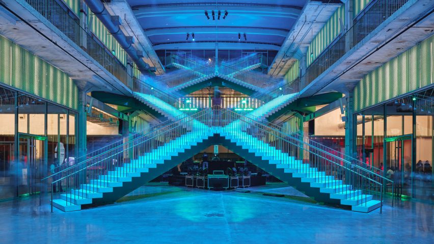 X-shaped staircases illuminated with blue lighting
