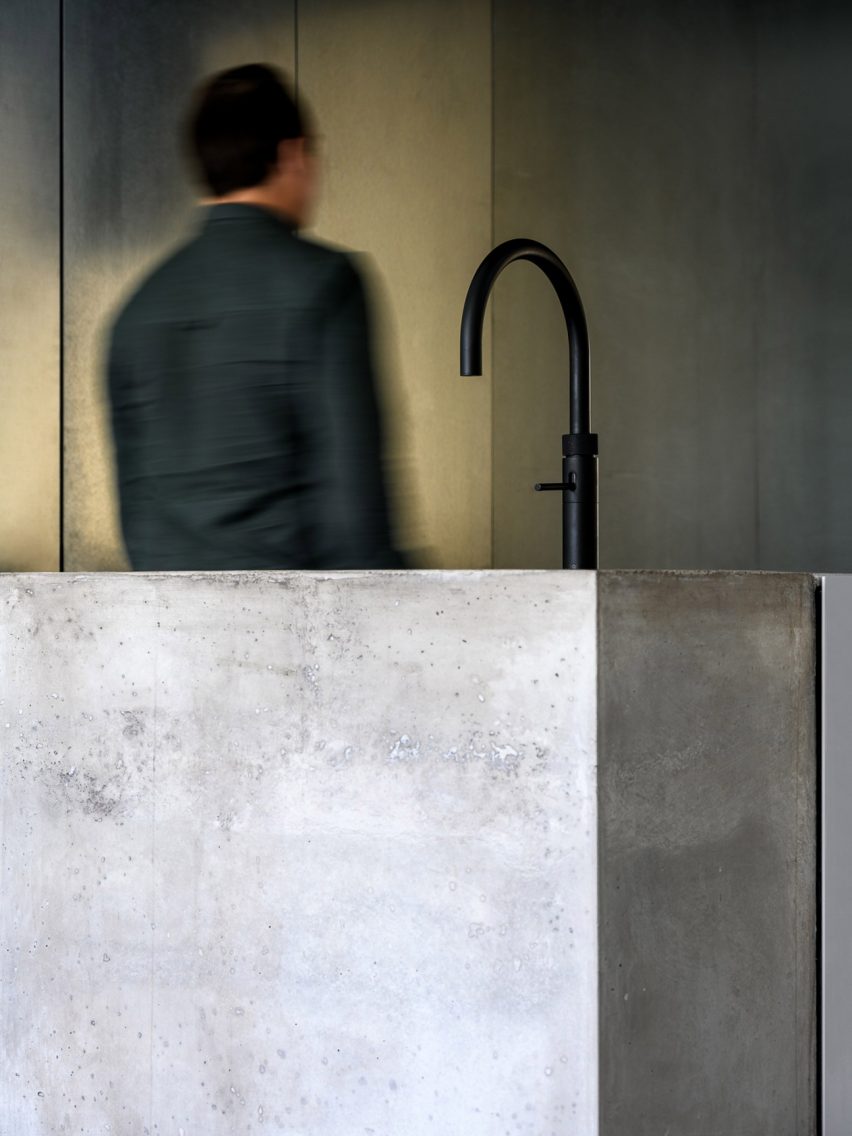 Concrete sink inside Reflections of the Past loft in Amsterdam by Firm Architects