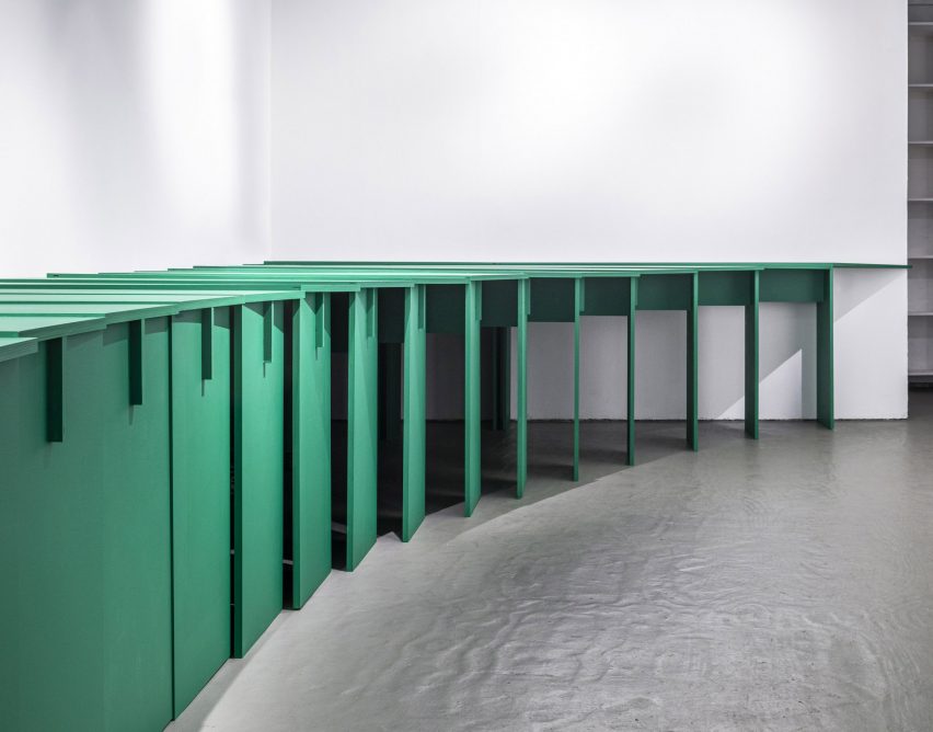 Row of interlocking green tables by Lanza Atelier for Storefront for Art and Architecture 