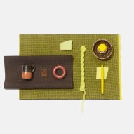 Swatches of Kvadrat's Sabi textiles in a seaweed green and deep brown colour