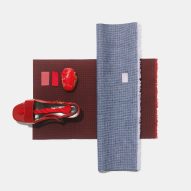 Swatches of Kvadrat's Sabi textiles in a crimson red and grey-blue
